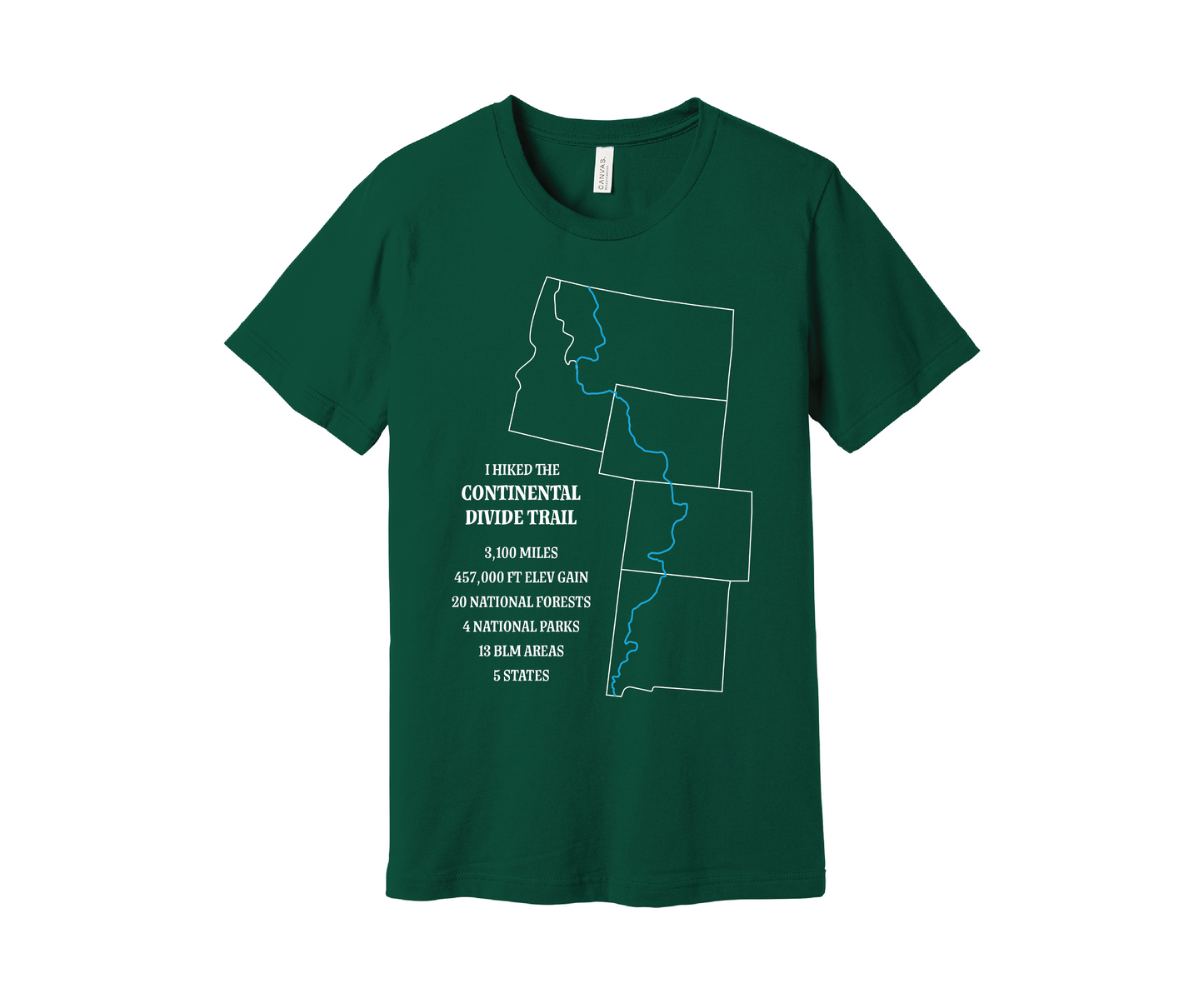 An evergreen-colored T-shirt displays a white outline of Arizona, Colorado, Montana, Wyoming and Idaho with the route of the Continental Divide Trail marked by a blue line. Text reads, "I hiked the Continental Divide Trail - 3,100 miles, 457,000 ft of elevation gain, 30 national forests, 4 national parks, 13 BLM areas, 5 states.