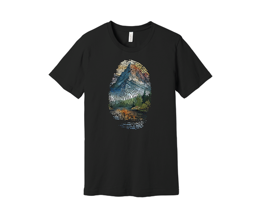 A black t-shirt featuring a colorful design of a mountain landscape encapsulated within a fingerprint pattern. The design includes blue, green, orange, and yellow hues, resembling a scenic outdoor view of a mountain and pine trees reflected in a lake below.