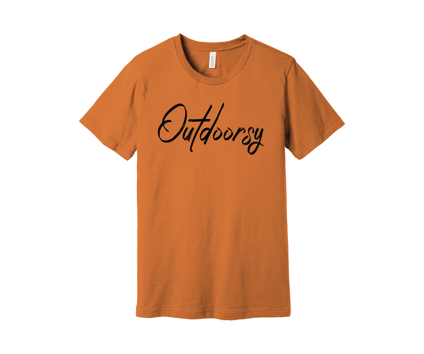 A burnt orange colored T-shirt with the word "Outdoorsy" printed on it in a stylish black cursive font. The shirt is displayed on a white background.